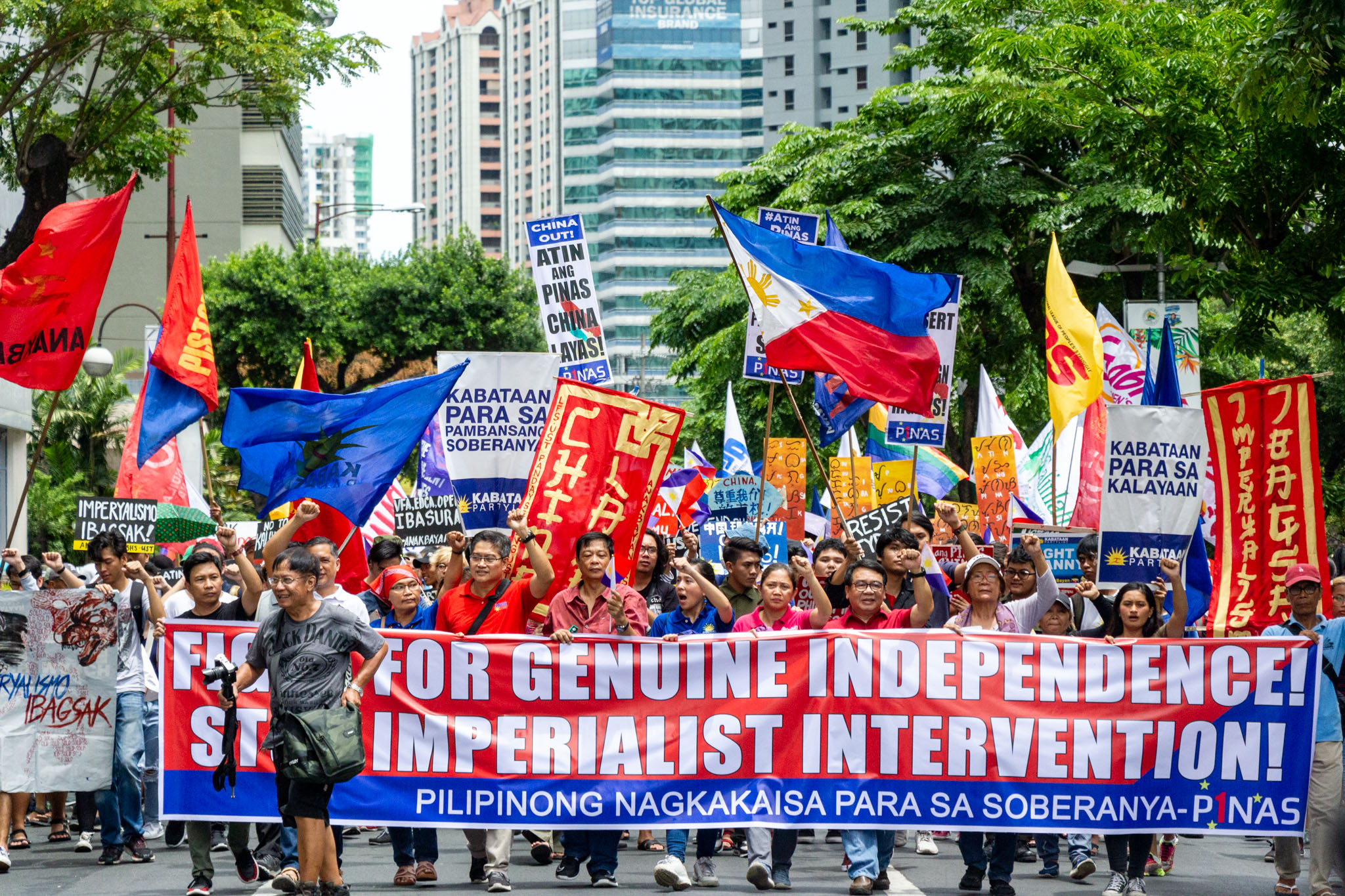 Protesters March To US Embassy Chinese Consulate In Independence Day 