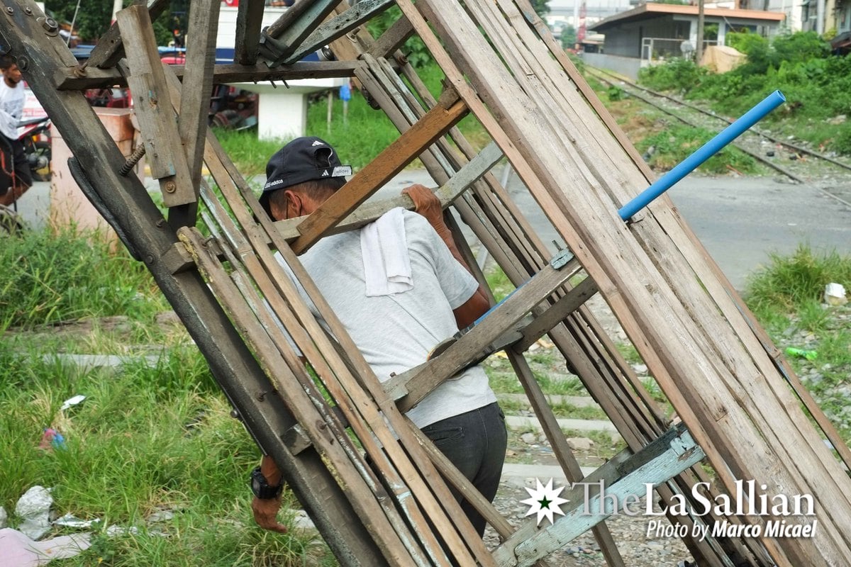 Between trains, on tracks The trolleys that ply the PNR The LaSallian